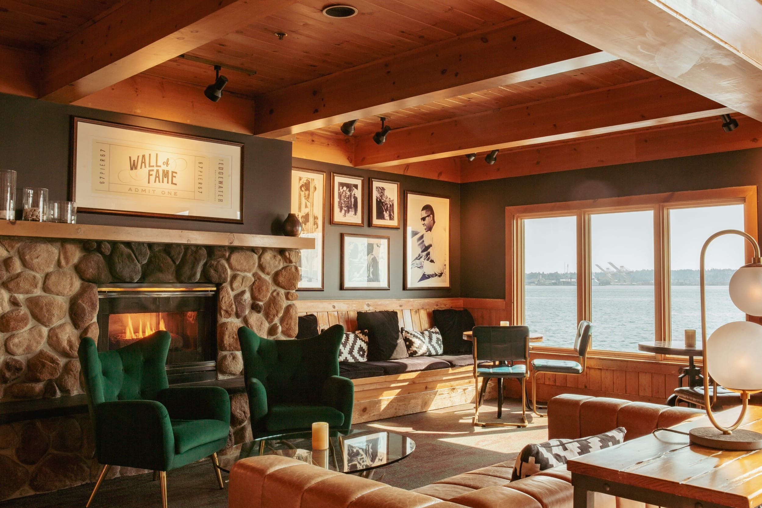 Lounge area at The Edgewater with a fantastic view of the water and a fireplace