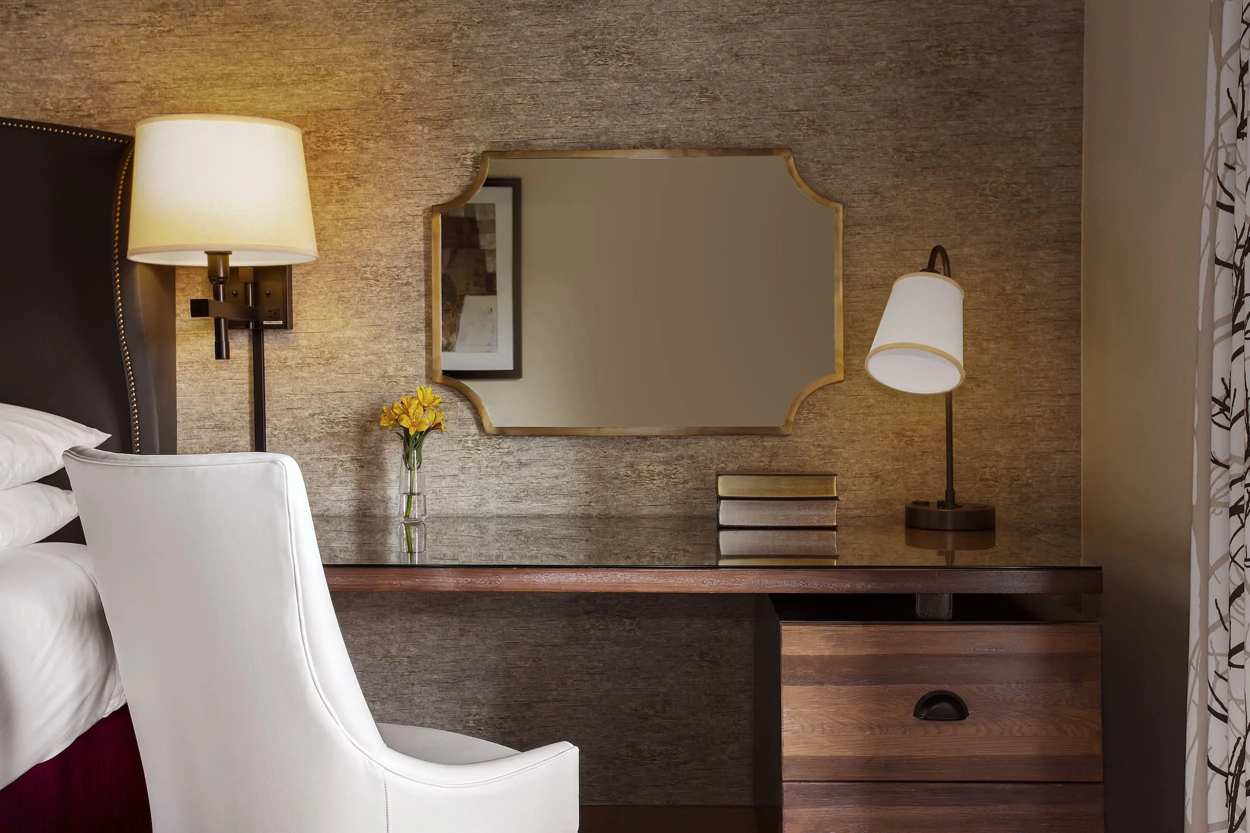 A beautiful wooden desk beside a bed at Edgewater