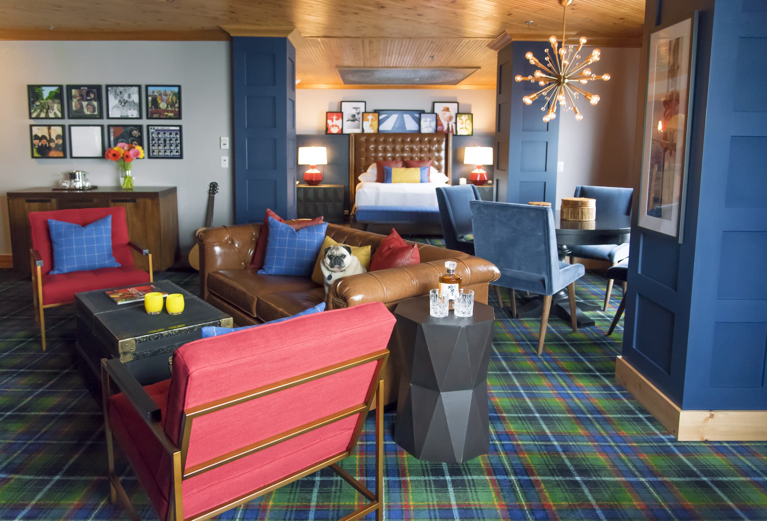 The Beatles suite at Edgewater with a lounge space and Beatles inspired bedroom