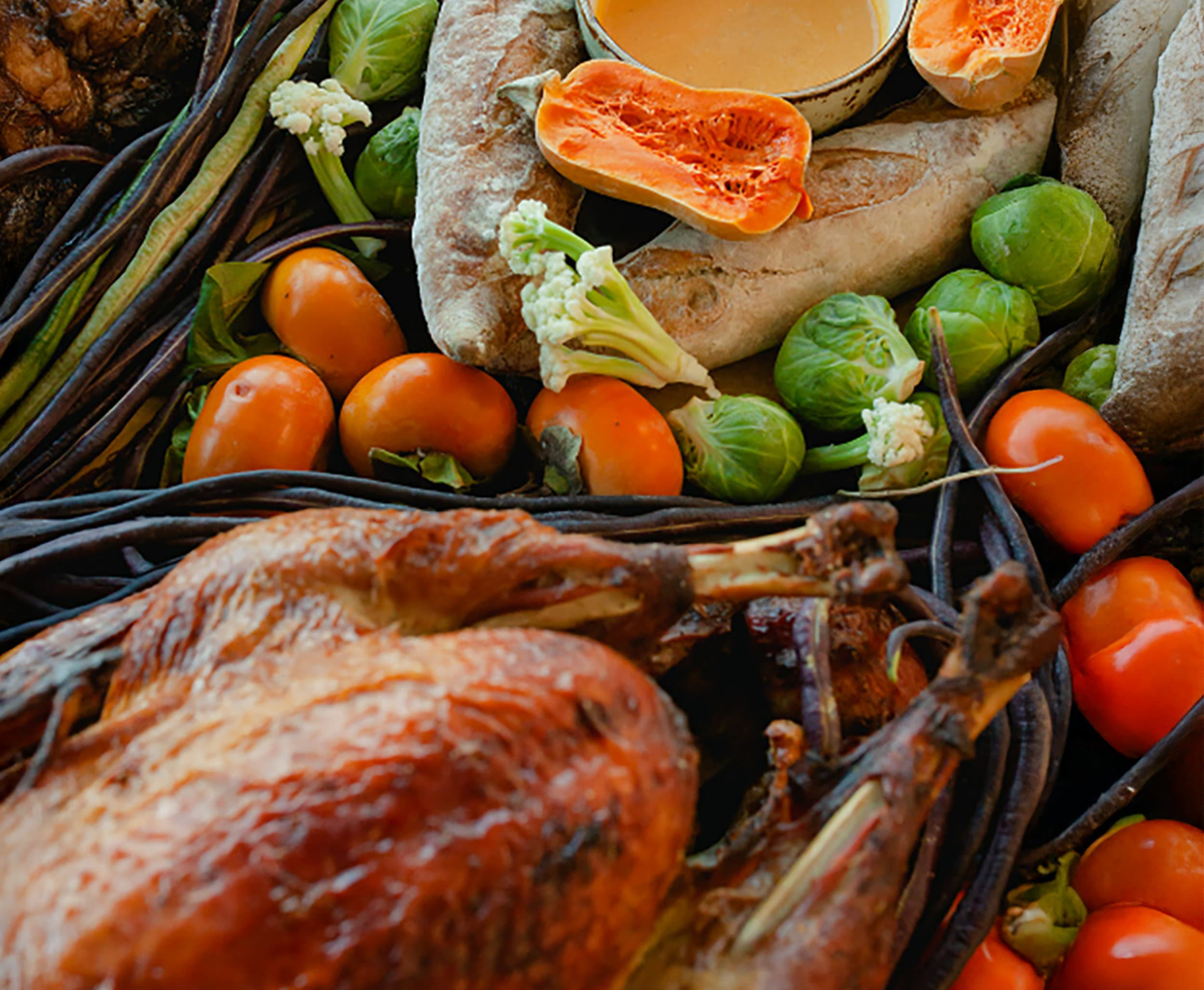 Thanksgiving dinner at The Edgewater Hotel in Seattle: a golden roast turkey with butternut squash, Brussels sprouts, cauliflower, rustic bread and seasonal produce