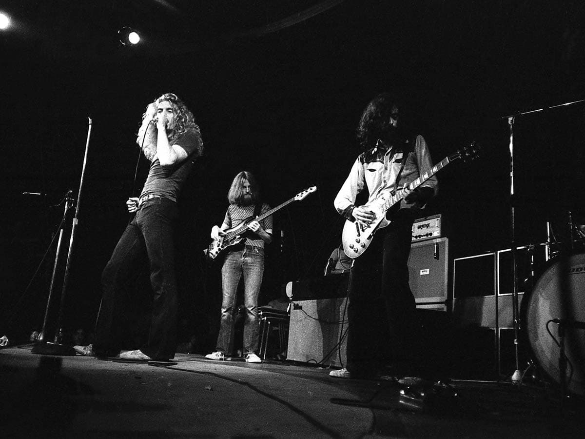 Led Zeppelin playing on stage